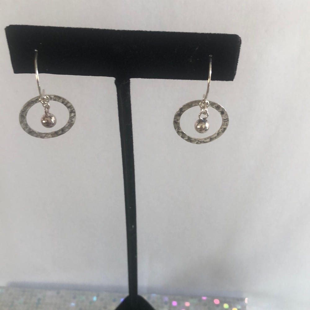 Handmade sterling hammered open disk with middle bead earrings